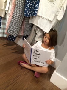 Reading is serious, even on the floor at the Gap.